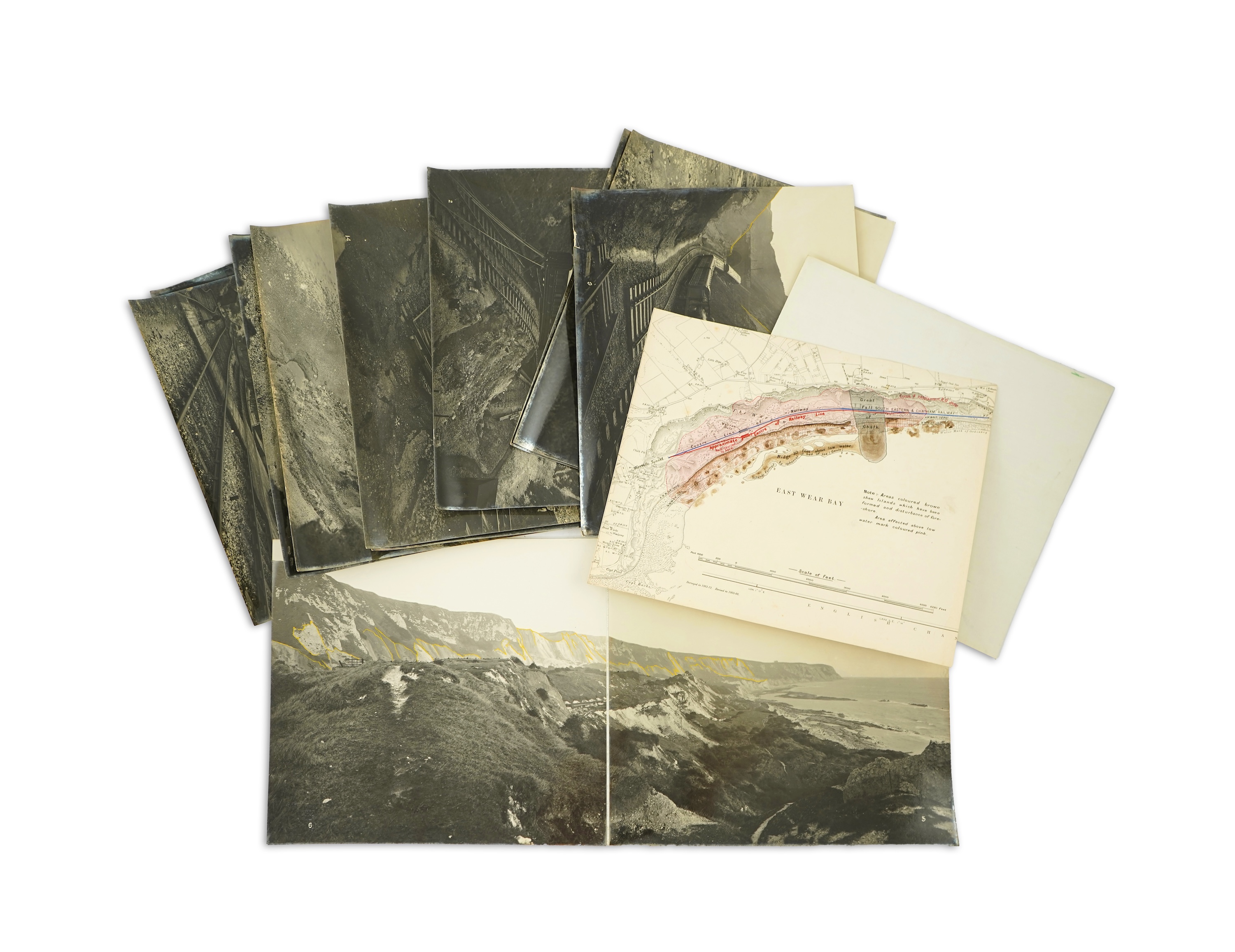 Fourteen late 19th/early 20th century black and white photographs of the results of a chalk landslide on the SE&CR, South East and Chatham Railway, at East Wear Bay, Capel-le-Ferne, Kent, with annotations to the reverse